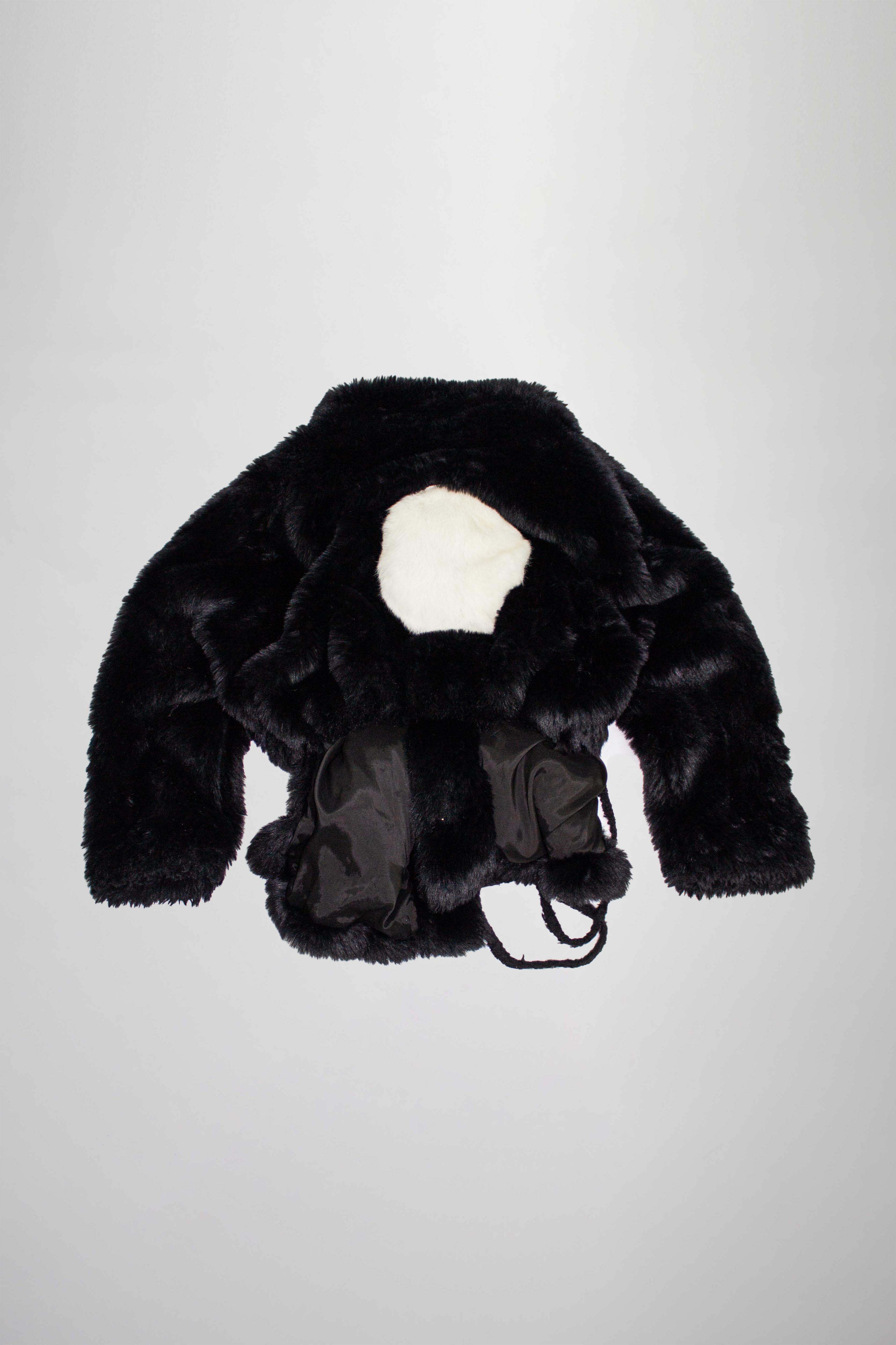 Manteau en fausse fourrure