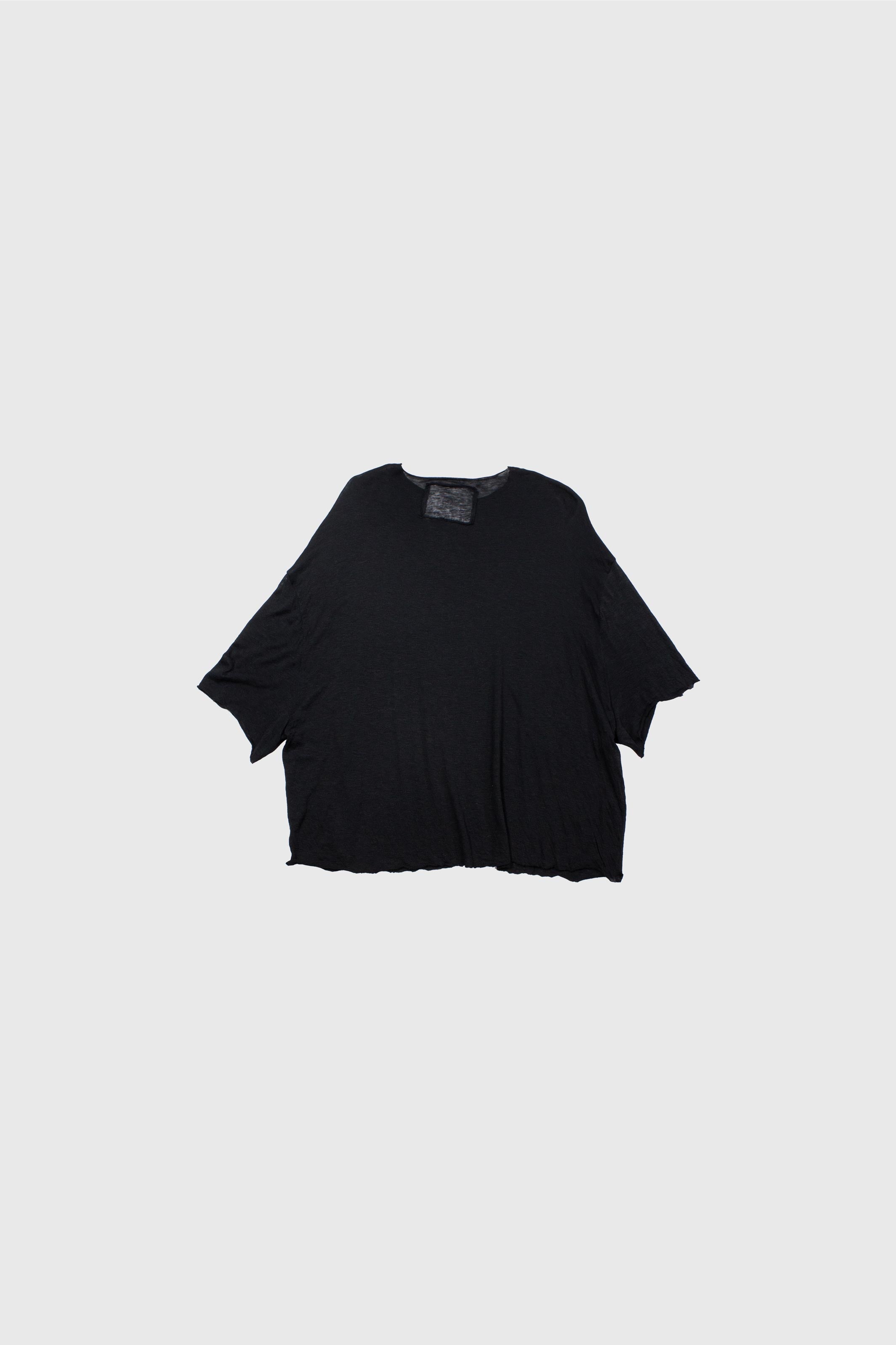 Black t-shirt flat lay front view displaying crew neckline and loose fit construction