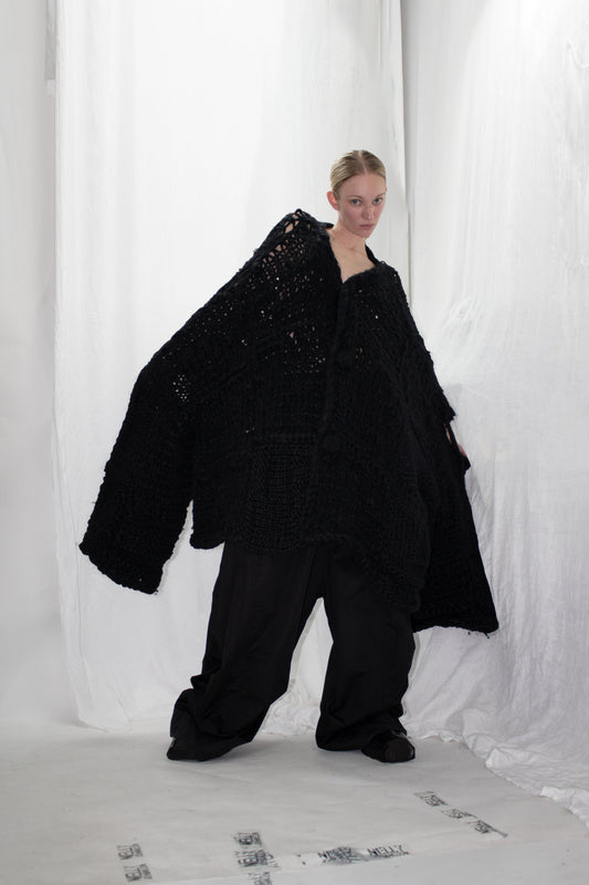 NELLY JOHANSSON 2023–24 collection: oversized black jacket with wide black trousers 1