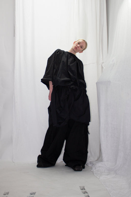 NELLY JOHANSSON 2023–24 collection: black oversized top with wide balloon trousers 6