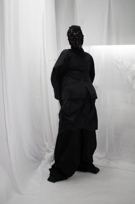 NELLY JOHANSSON 2023–24 collection: masked figure in long black draped layers 10