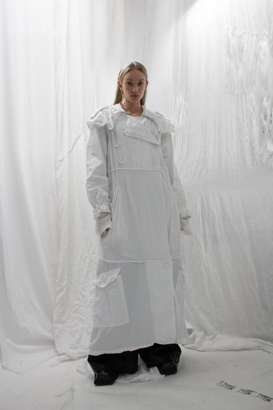 NELLY JOHANSSON 2023–24 collection: long white coat with a white collar 11