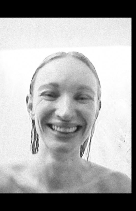 NELLY JOHANSSON 2023–24 collection: smiling black-and-white portrait 23