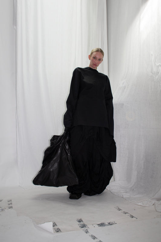 NELLY JOHANSSON 2023–24 collection: black draped top and voluminous black skirt with a bag 29