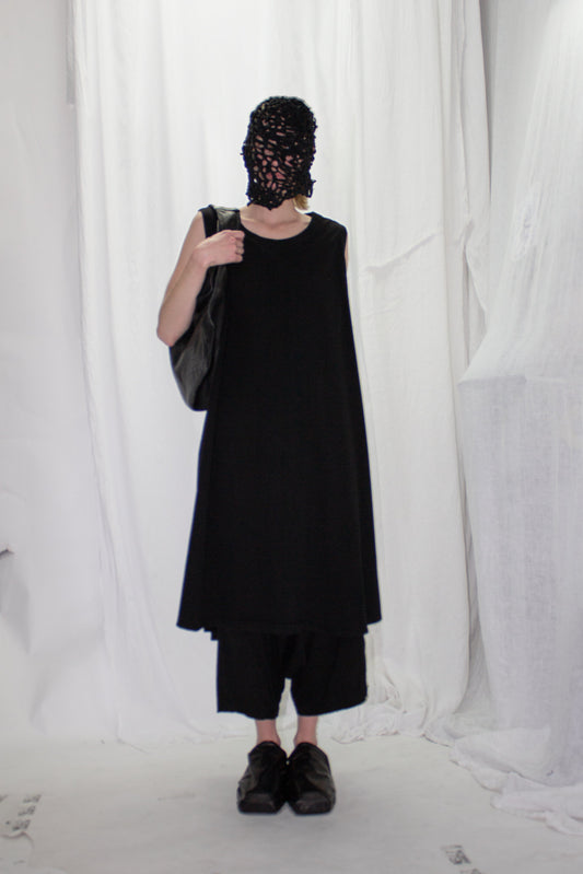 NELLY JOHANSSON 2023–24 collection: masked model in a black tunic dress and black shorts 34