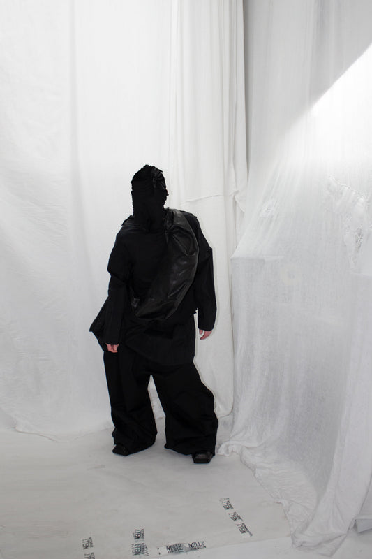 NELLY JOHANSSON 2023–24 collection: hooded figure in black 63